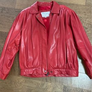 Vintage (early 90s) red genuine leather jacket. Slight shoulder pads, size small